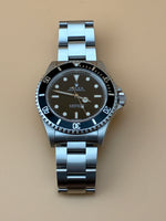 Rolex Submariner 14060M – 2-Line No Date – Classic Aluminum Bezel - Image 1